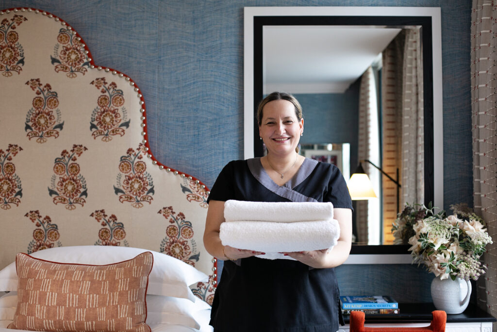 Room Attendant is preparing a room for guests at the Dorset Square Hotel