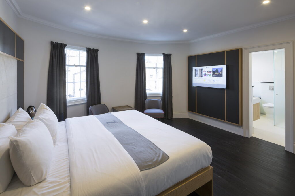 tylish hotel room at Z Hotels, featuring contemporary decor and comfortable furnishings for a relaxing stay in Marylebone
