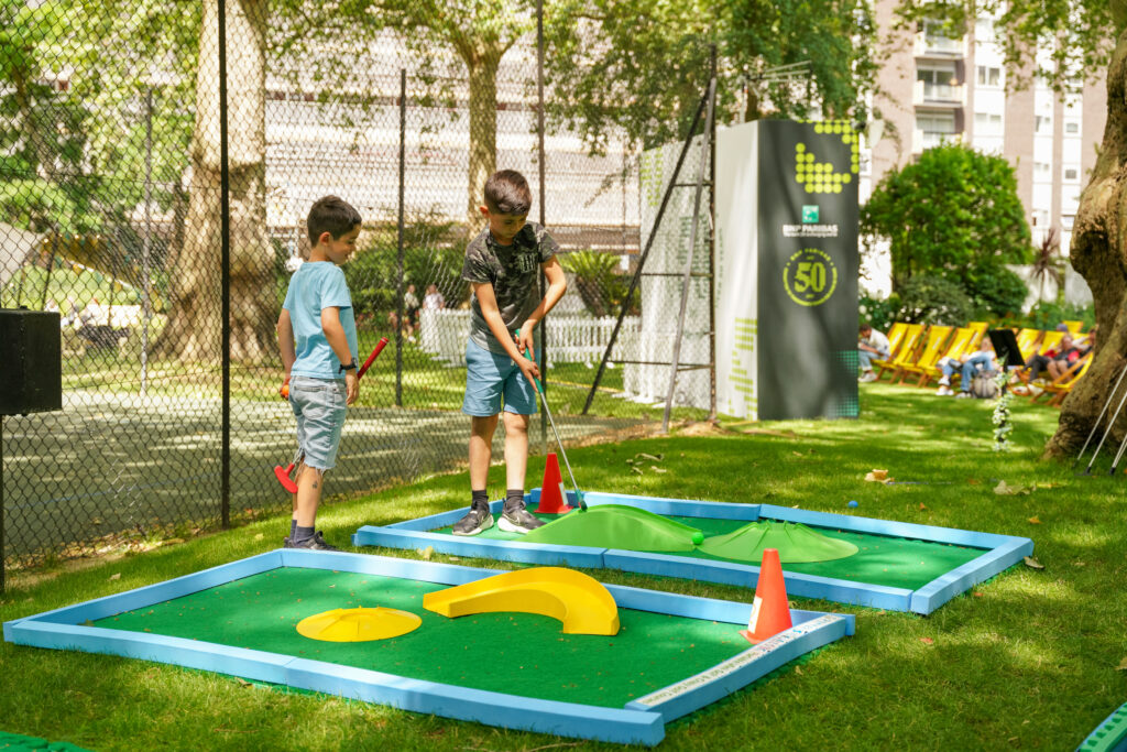 kids playing at summer in the square event, at Portman Square Garden in Marylebone
