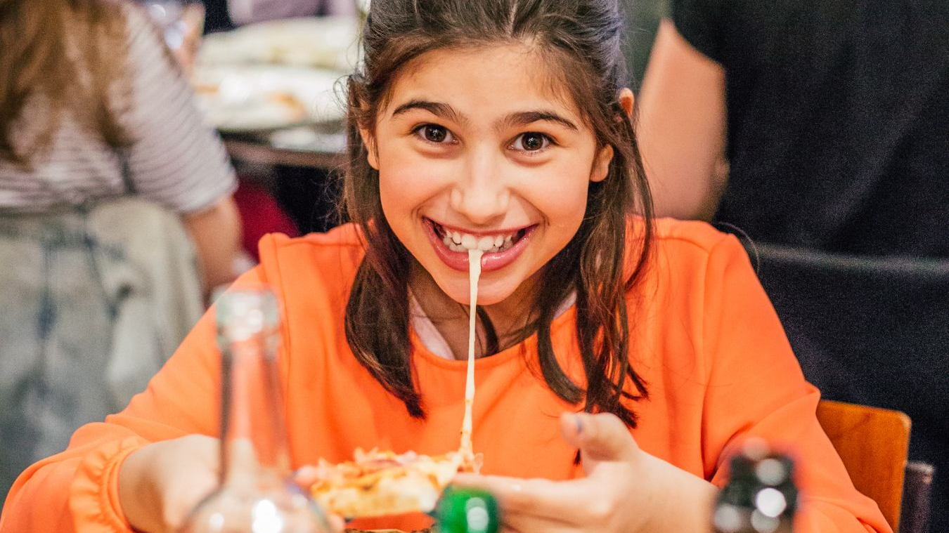 Young kid enjoying lunch in Marylebone