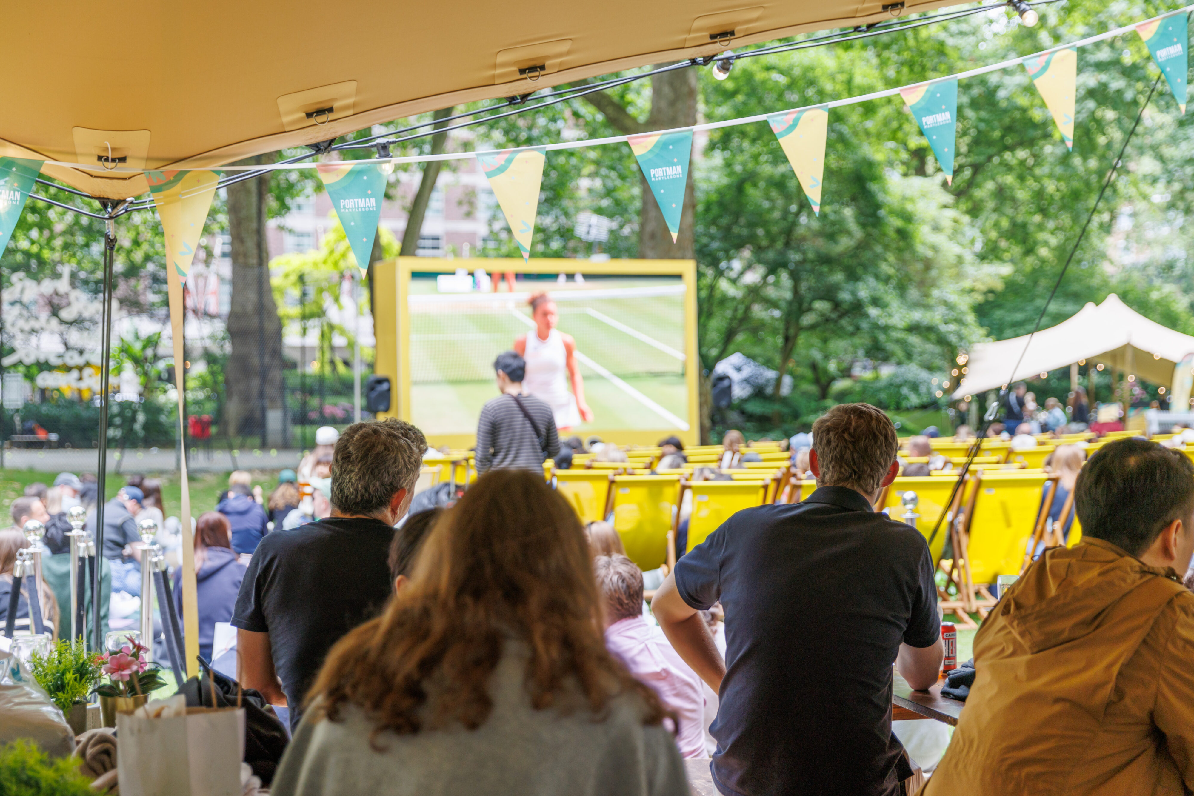 people having fun at Summer in the square festival in Marylebone