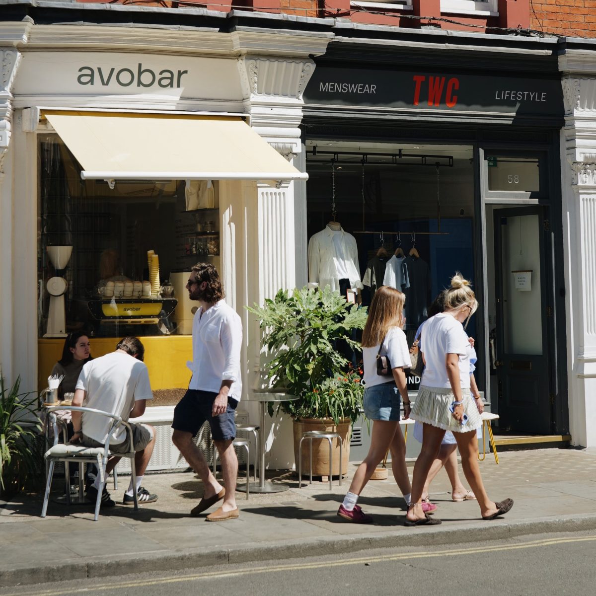 People walking in summer on CHiltern Street, Marylebone, London