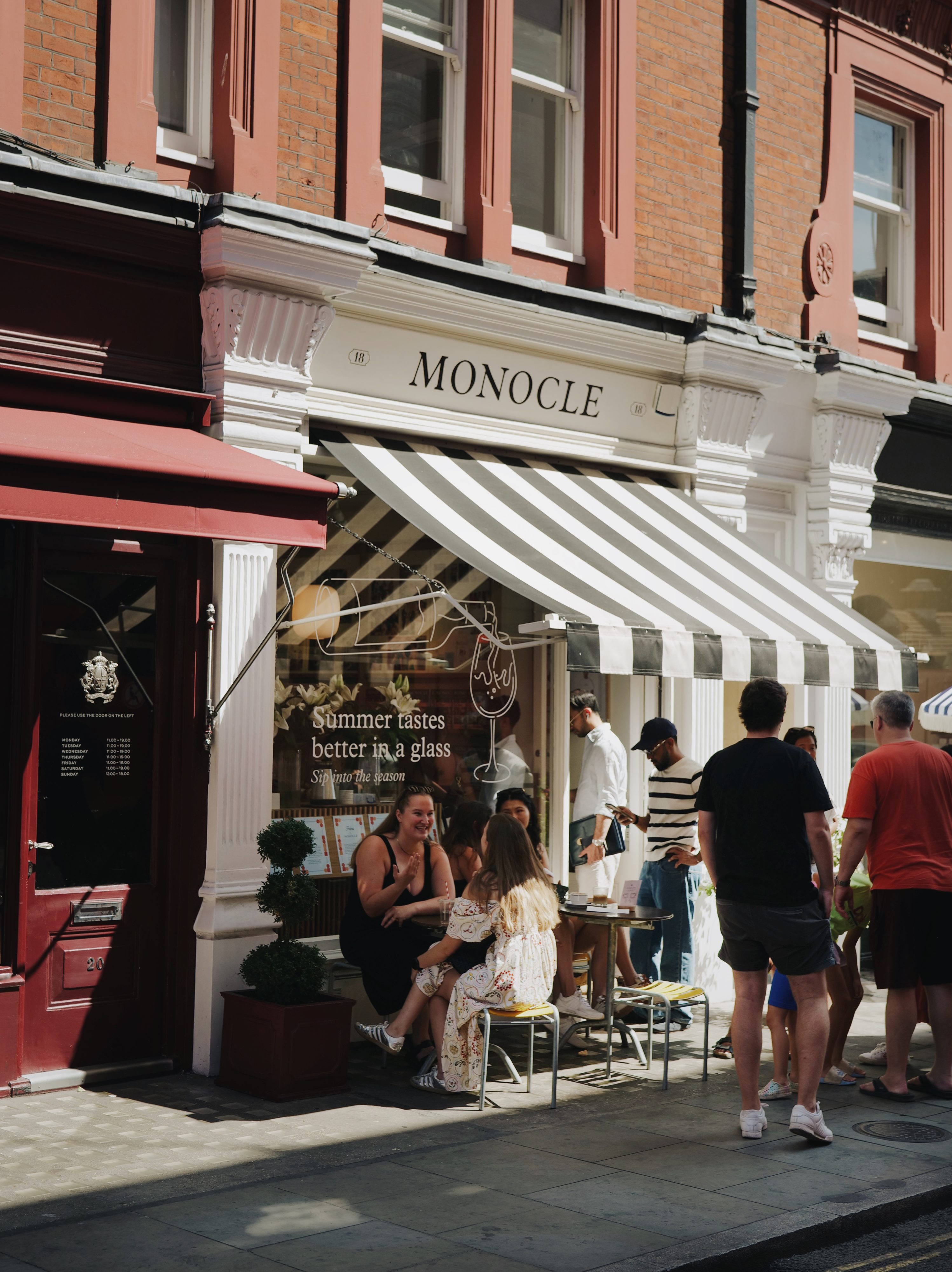 people shopping on Chiltern street, in front on Monocle